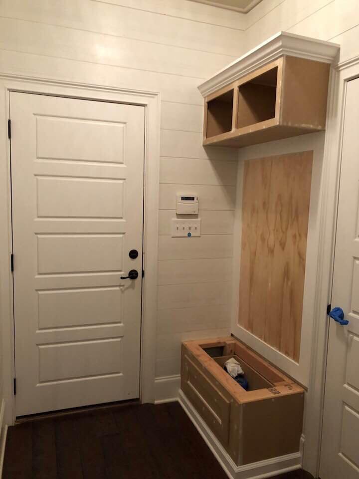 Before Image of Complete Mudroom Install with Floating Shelves hangers and Bench 3