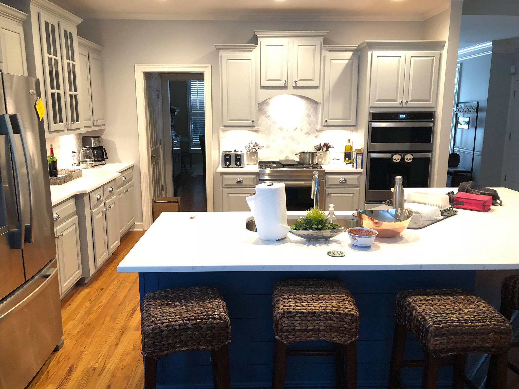 Full Kitchen Remodeling with Upper and Lower Cabinets Painted White