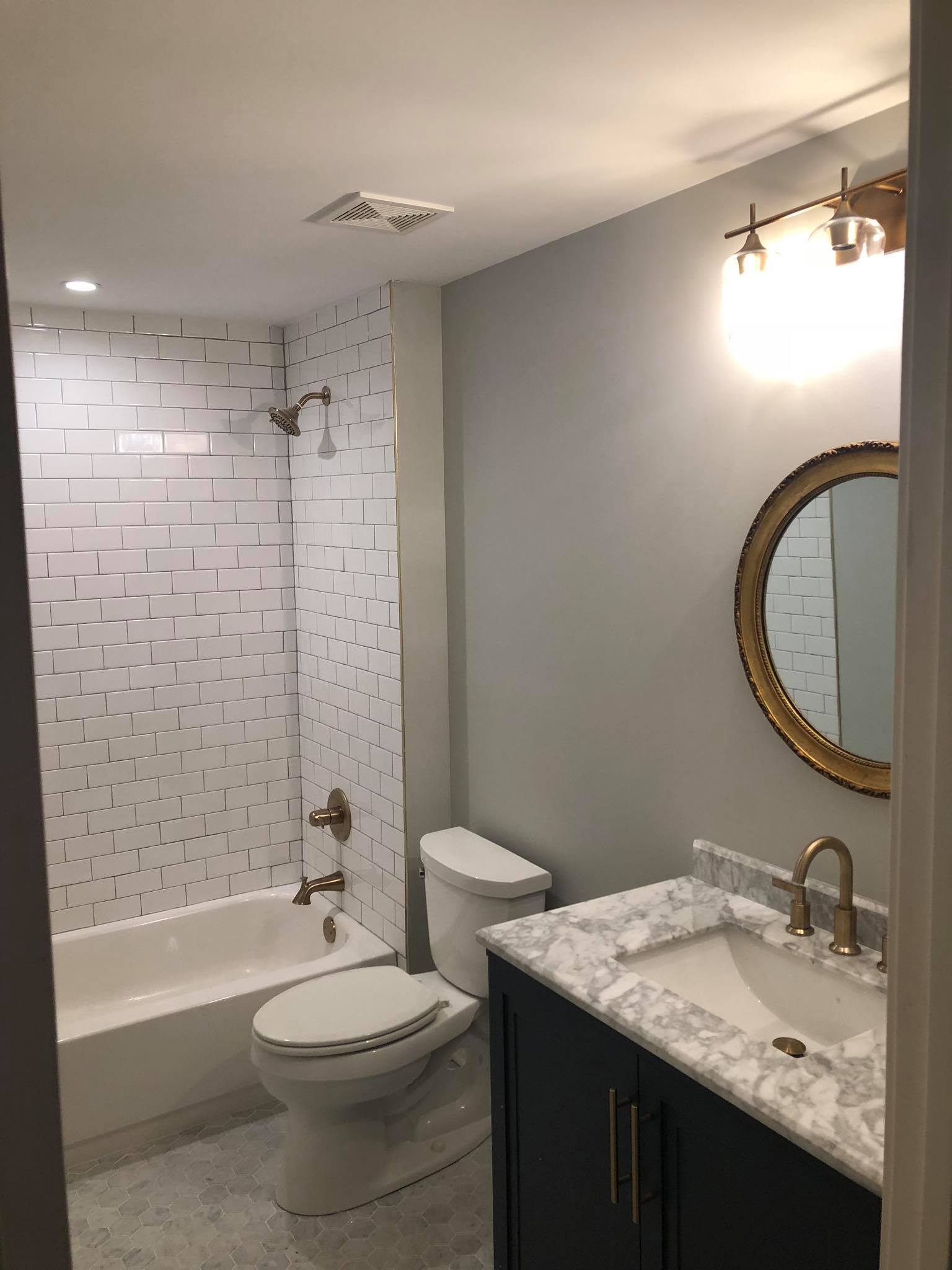 Bathroom Remodel with New Tiles and Double Door Vanity Side View
