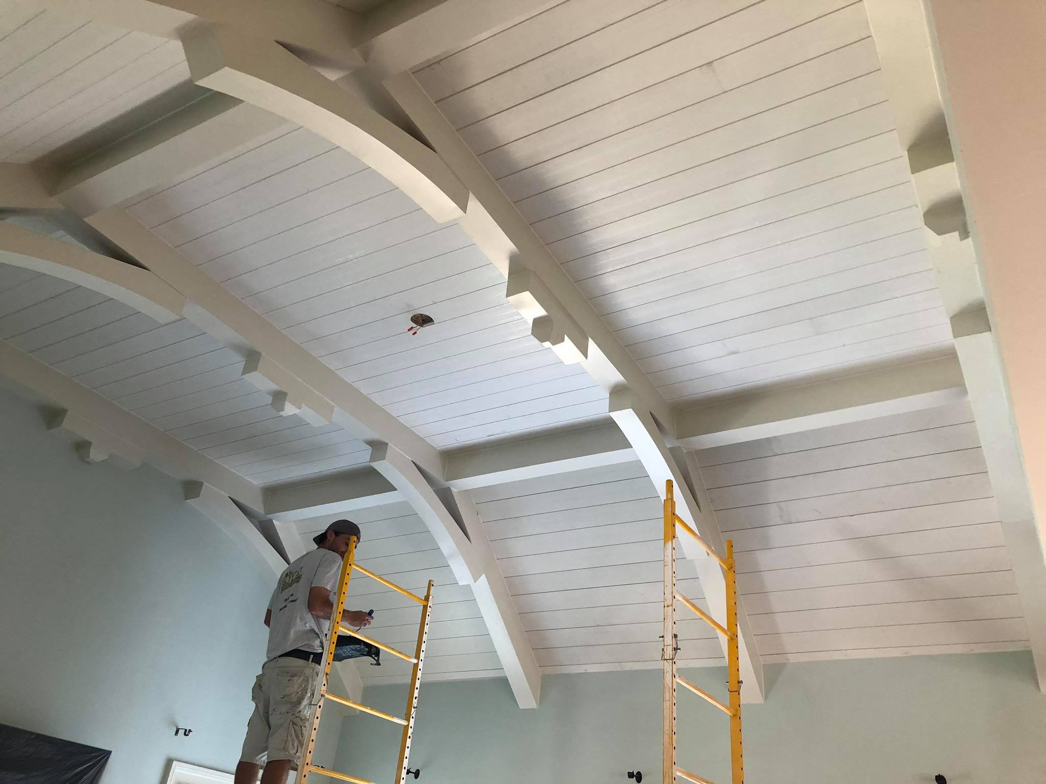 Amazing Ceiling with Multiple Beams and Shiplap Installed Painted White 5