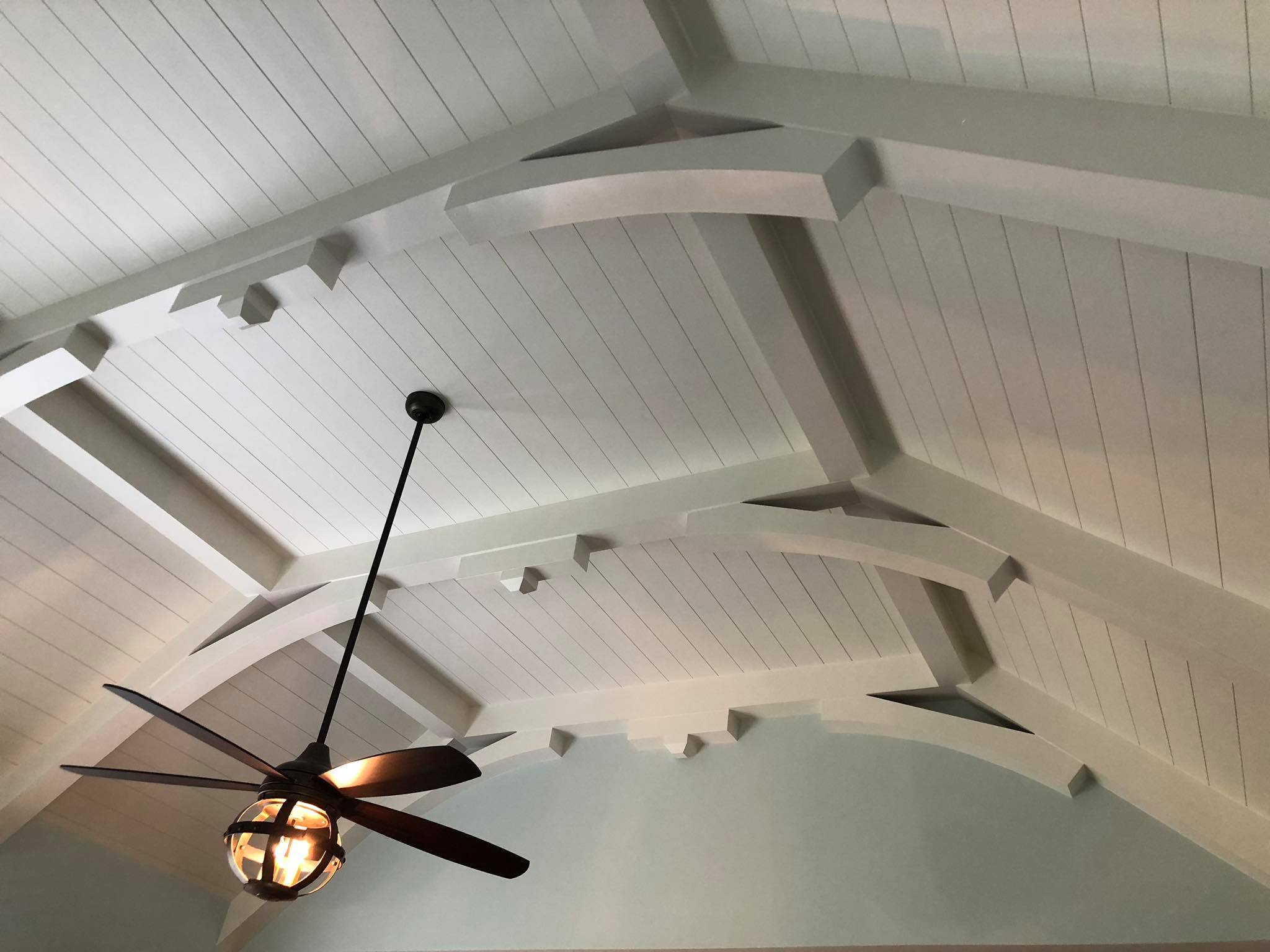 Amazing Ceiling with Multiple Beams and Shiplap Installed Painted White 2