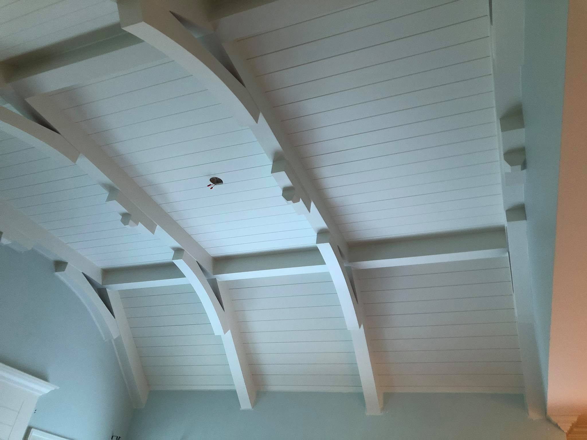 Amazing Ceiling with Multiple Beams and Shiplap Installed Painted White 1