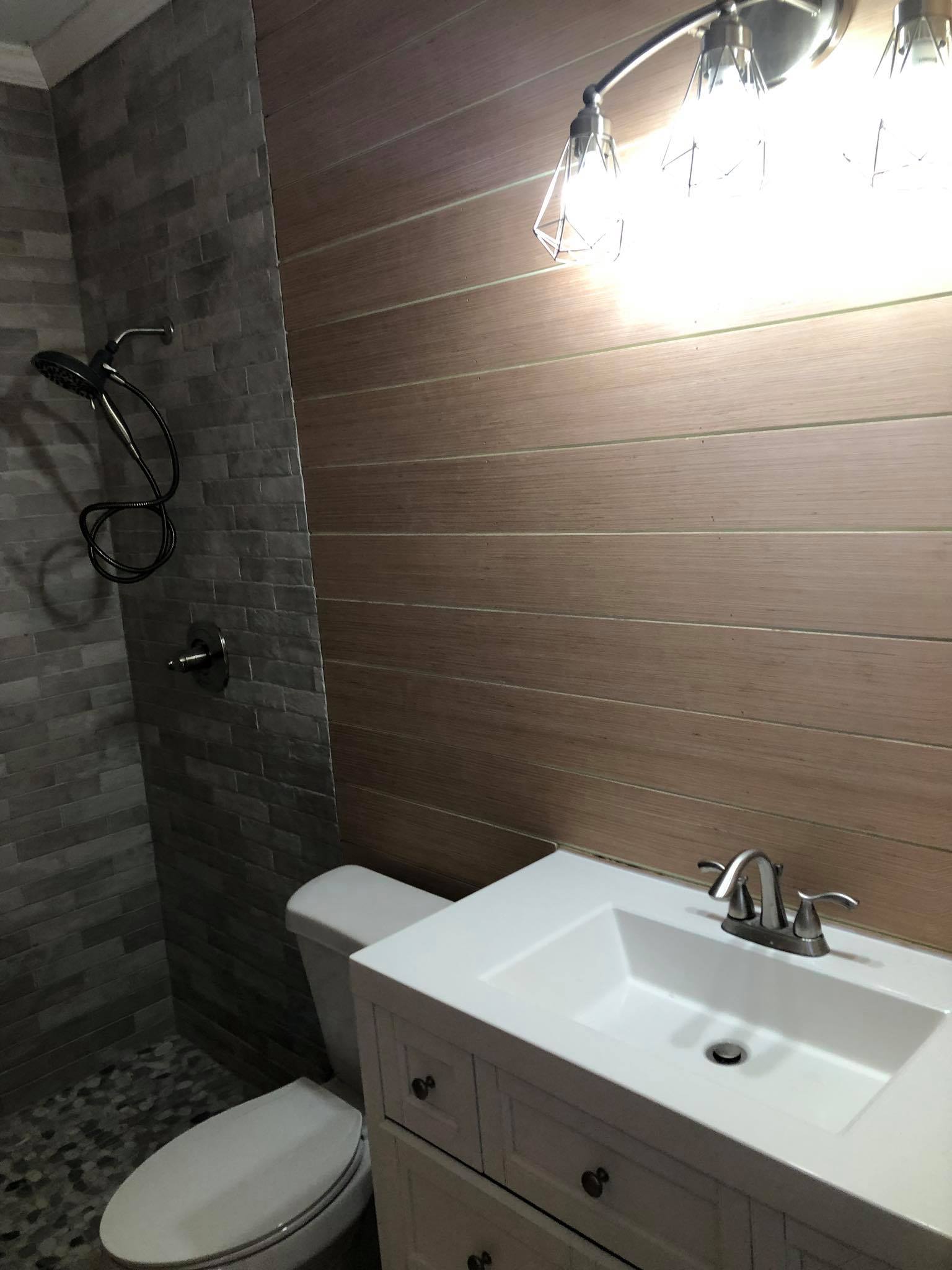 Bathroom Remodeling with New Tiles Showe and head 4