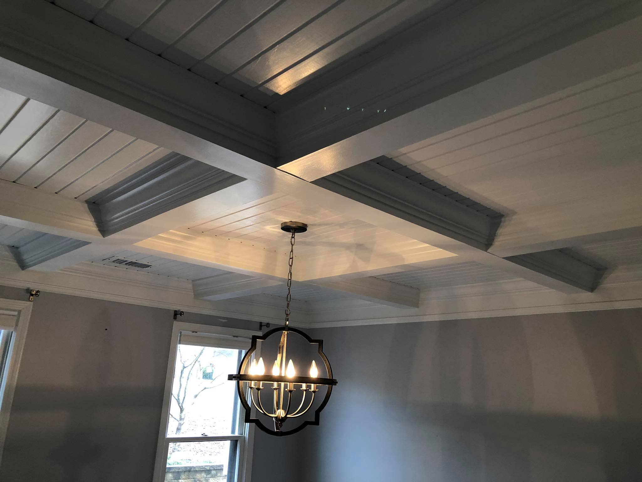 Custom Ceiling with Beams and Shiplap Paneling Painted White