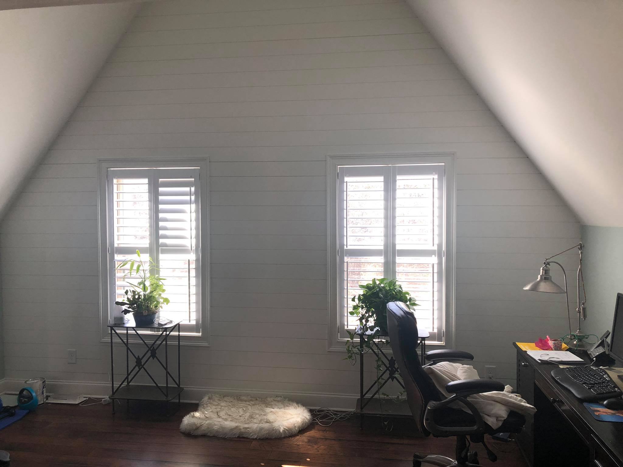 Shiplap On Walls Painted White with Hardwood Floor Installed 4