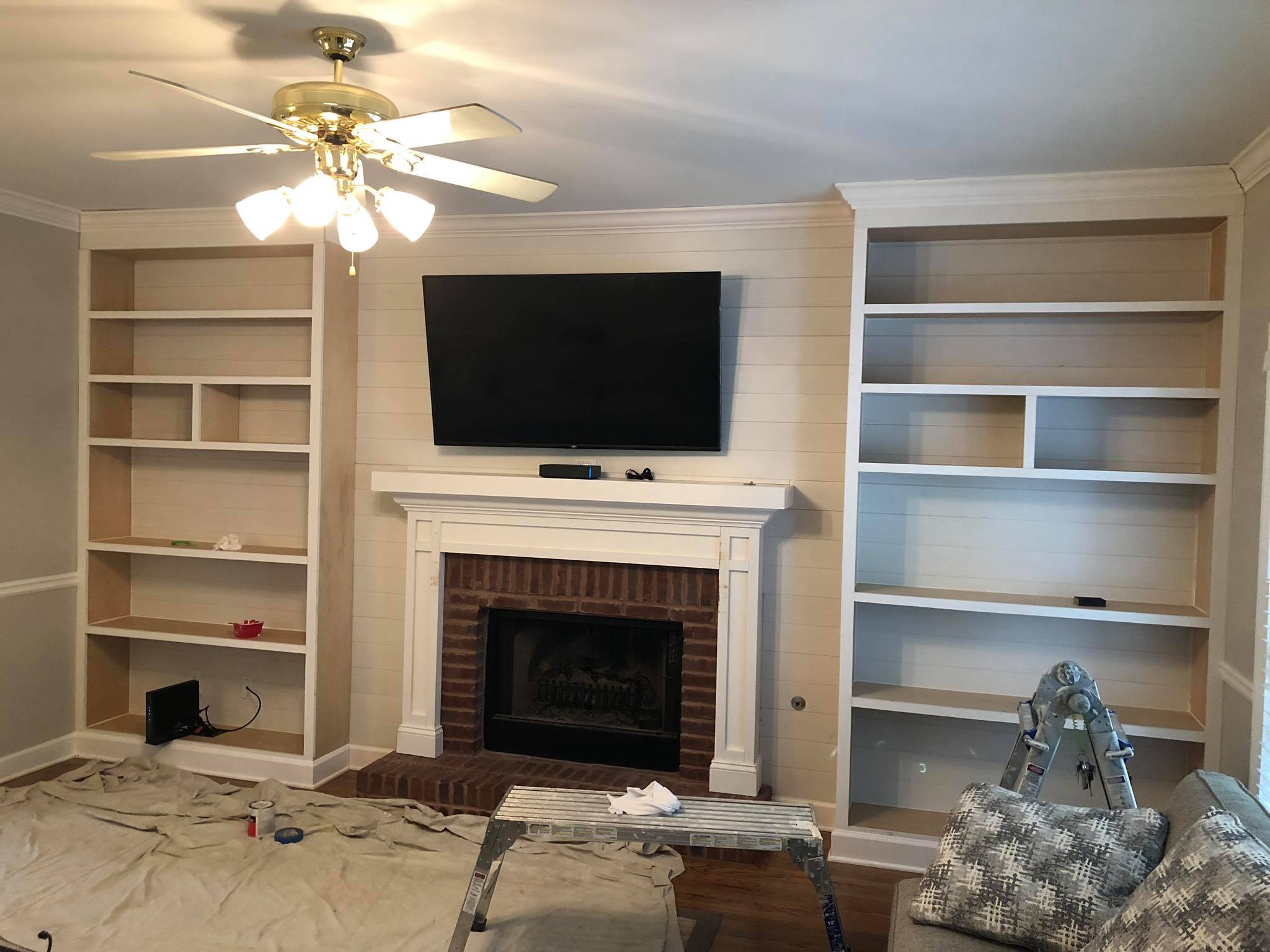 Fireplace Custom Wall High Built in Cabinets Shelves and Trim Painted White Installing 2