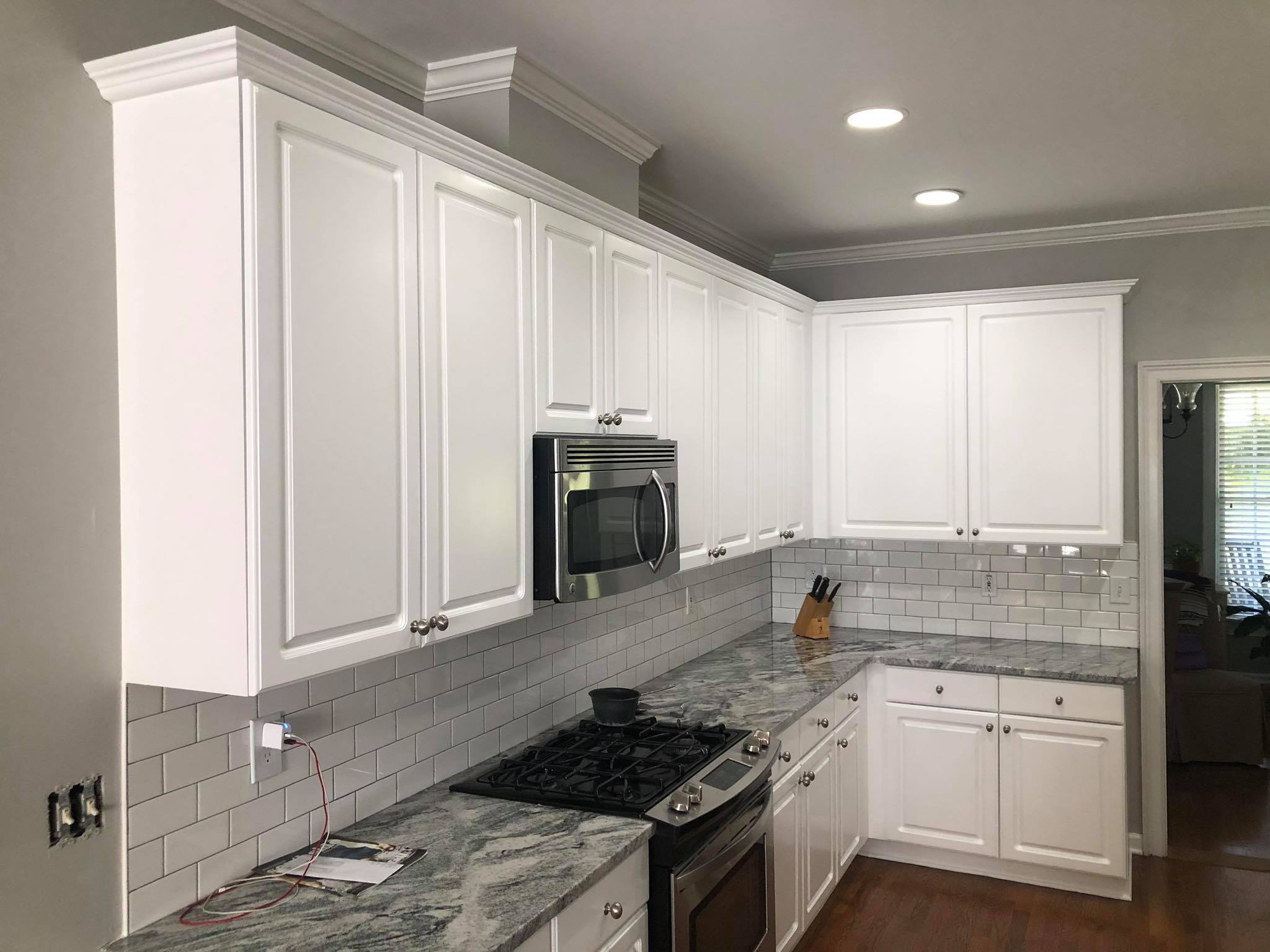 Complete Kitchen Remodel with Custom Painted faces and Kitchen Island Painted White 9
