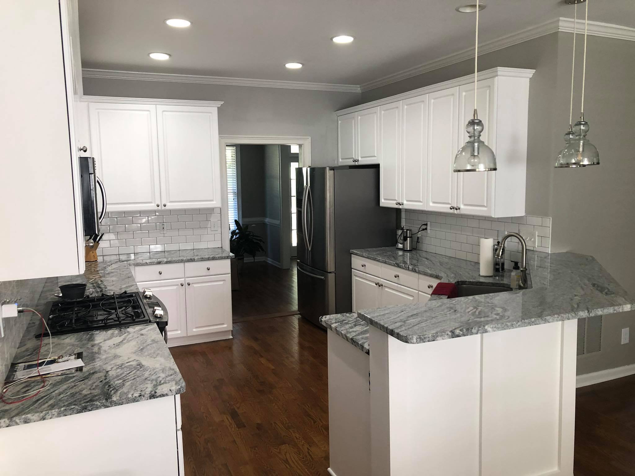 Complete Kitchen Remodel with Custom Painted faces and Kitchen Island Painted White 4