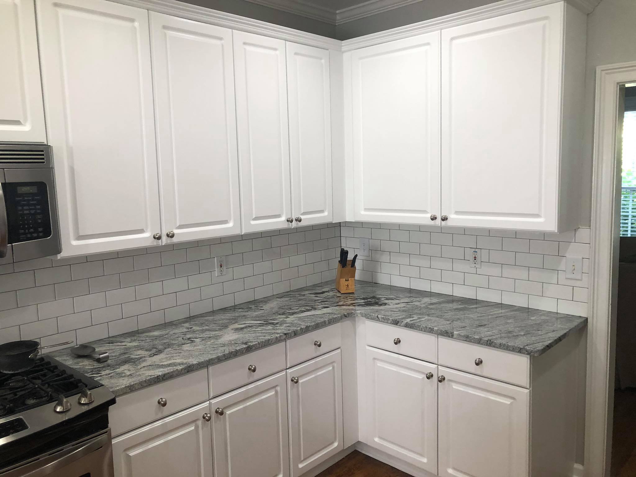 Complete Kitchen Remodel with Custom Painted faces and Kitchen Island Painted White 8