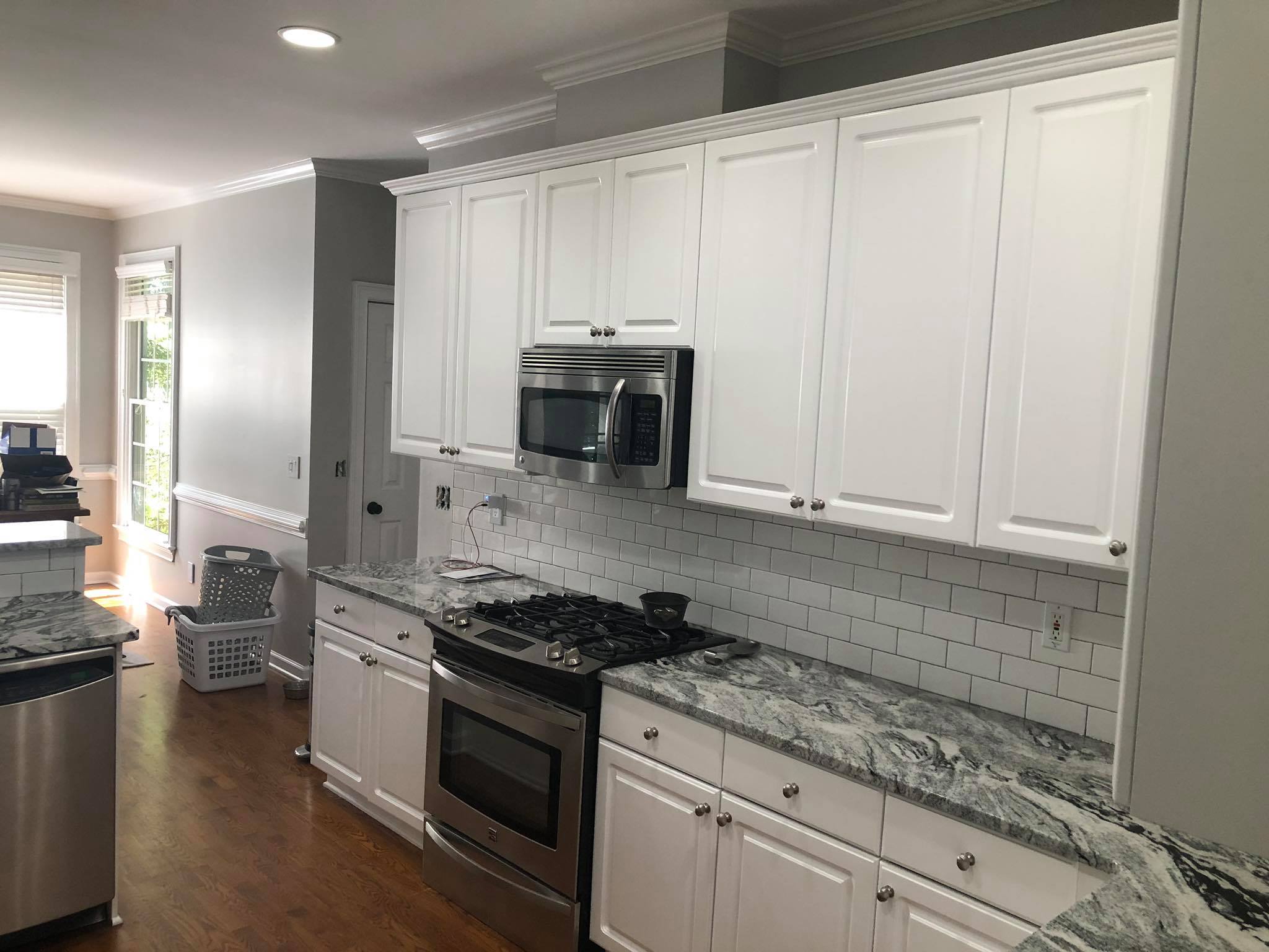 Complete Kitchen Remodel with Custom Painted faces and Kitchen Island Painted White 6