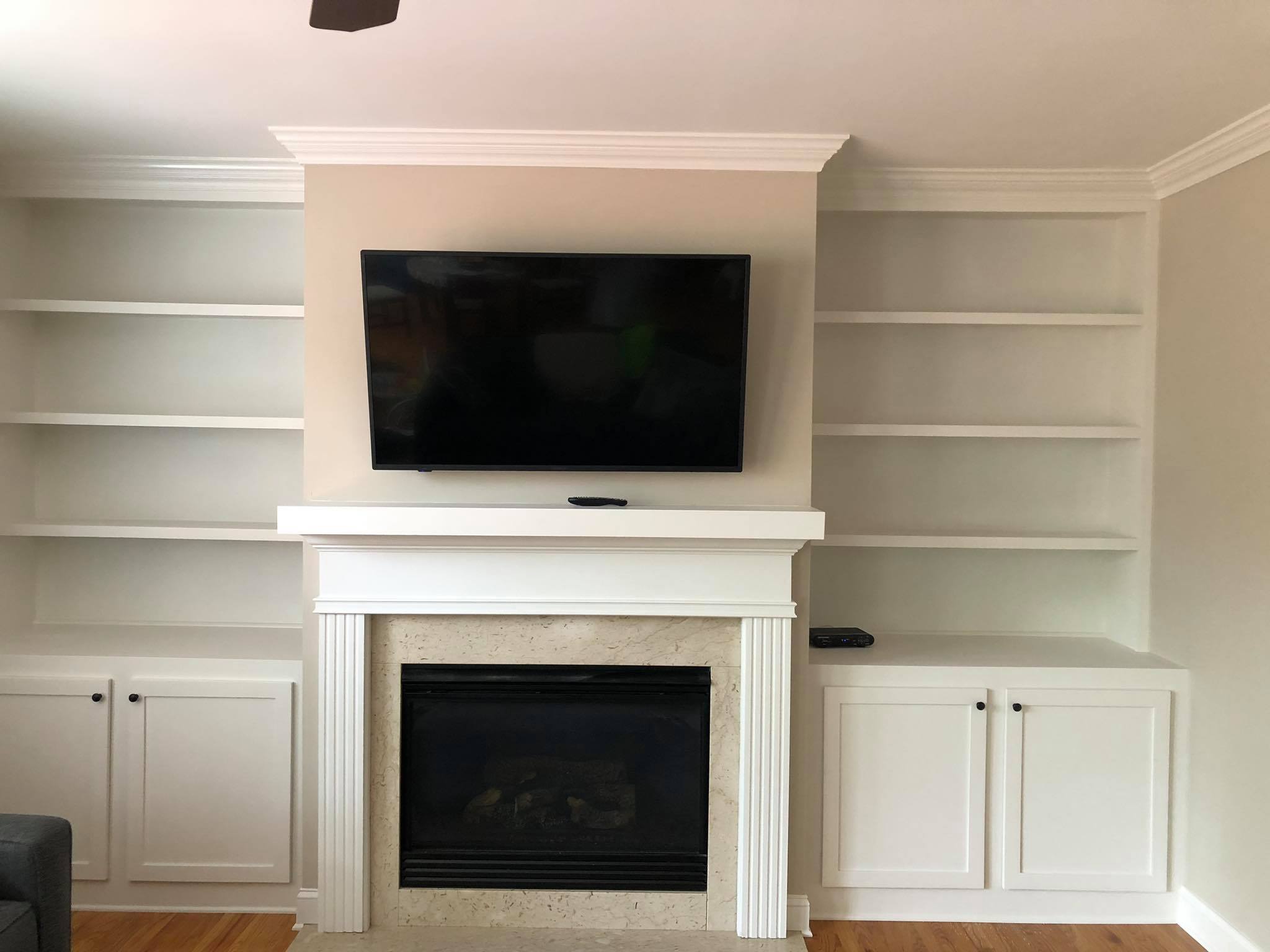 Fireplace Entertainment Center with Floating Shelves and Double Door Cabinets Front View 1