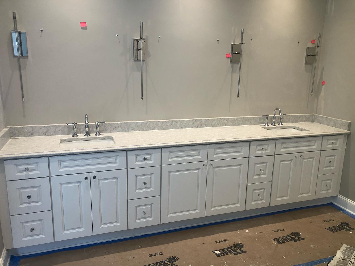 White Bathroom Vanities with Custom Knobs and Double Sink Front Wide View