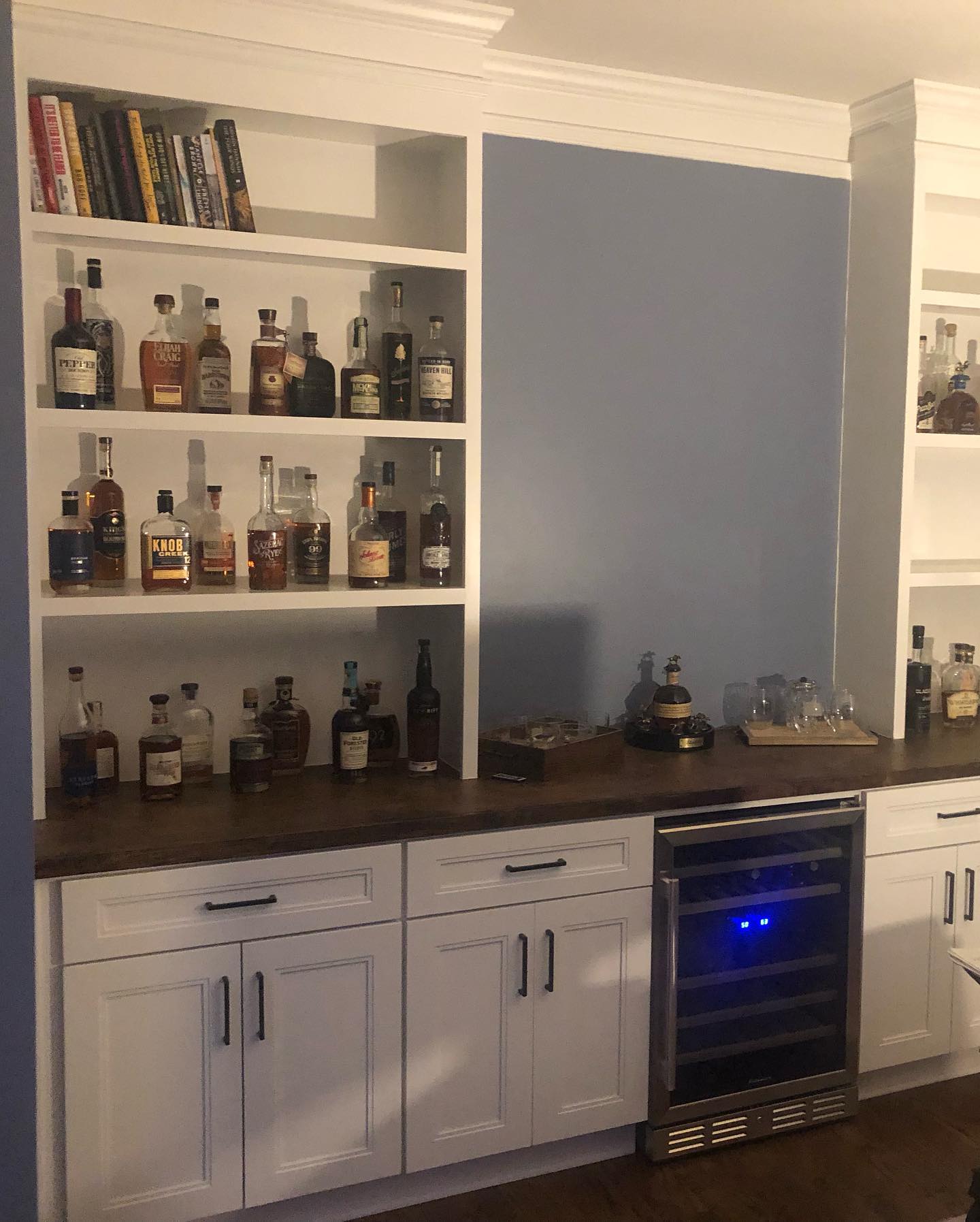 Custom Home Bar Built in Cabinets and Double Door Bases Painted White 5