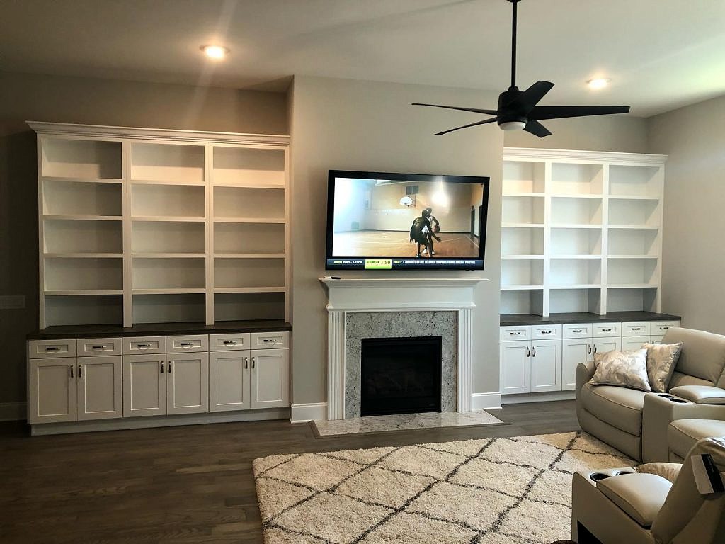 Built in Cabinets with Bookshelves and Custom Painted Tops