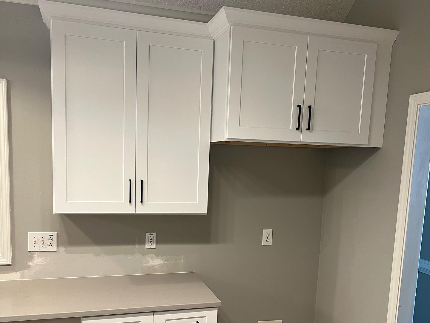 Wall Mounted Upper Cabinets with Custom Pulls